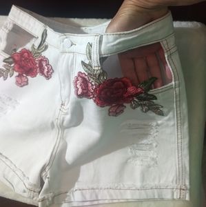 Adorable shorts w/cut out, adorned w/ flower